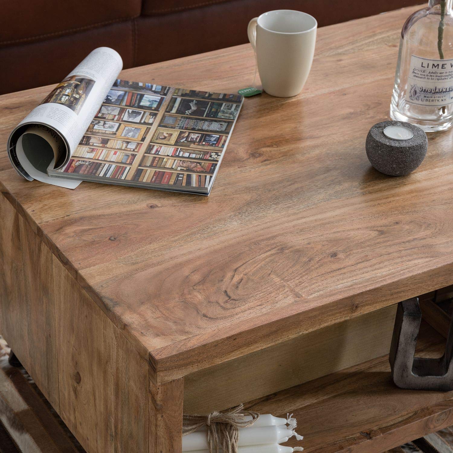 Coffee table made of solid acacia wood and metal