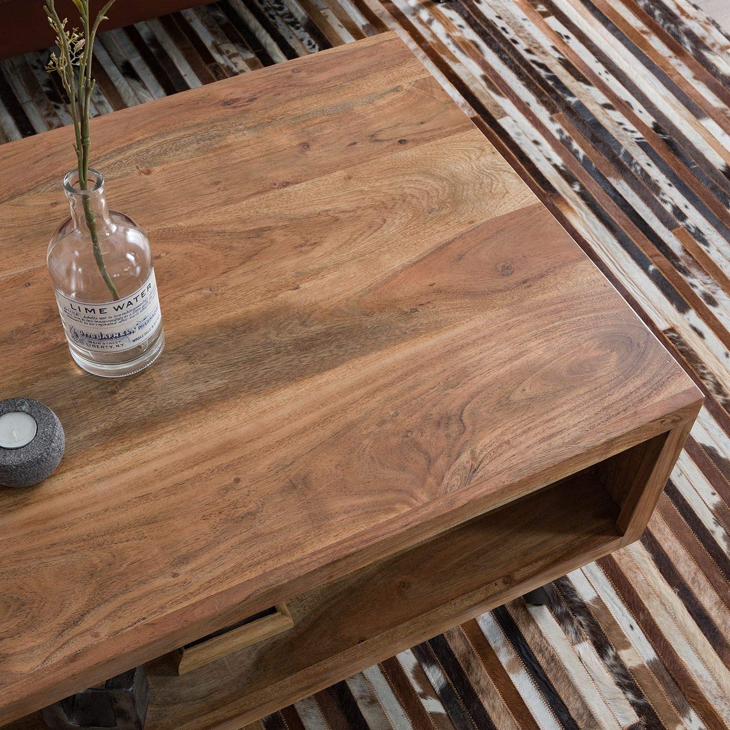 Coffee table made of solid acacia wood and metal