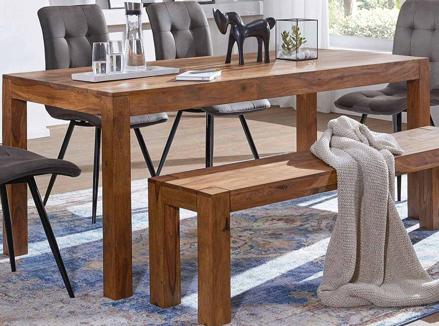 Four-seater dining table made of solid sheesham wood