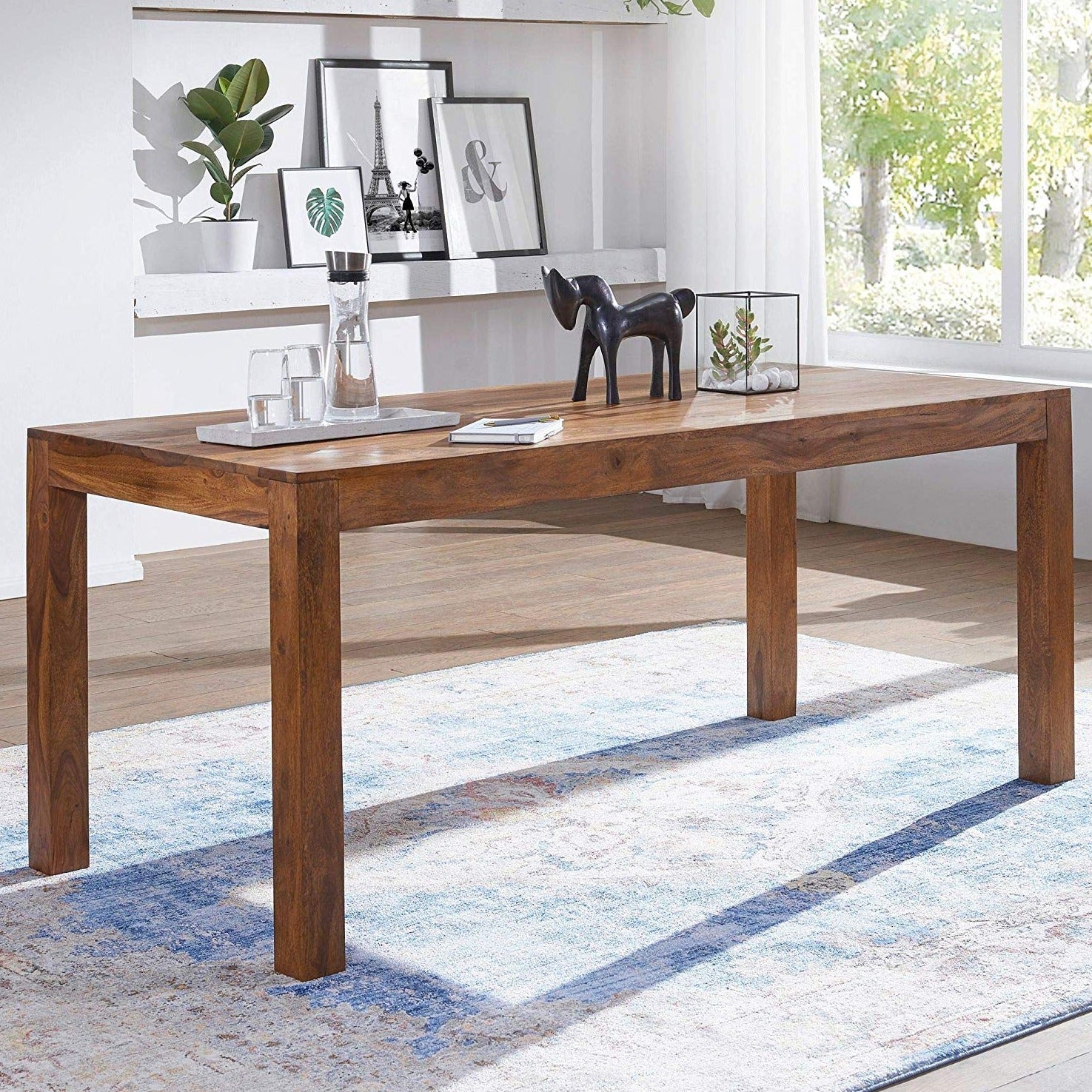 Four-seater dining table made of solid sheesham wood