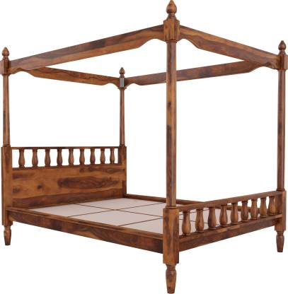 Queen poster bed made of solid sheesham wood