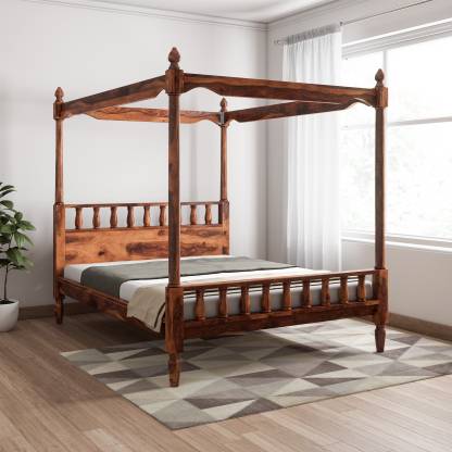 Queen poster bed made of solid sheesham wood